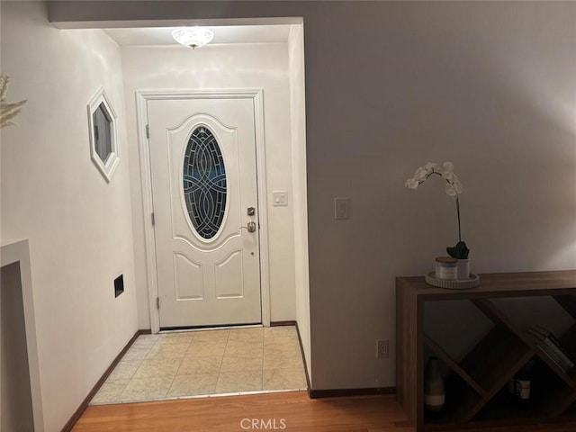 view of tiled entrance foyer