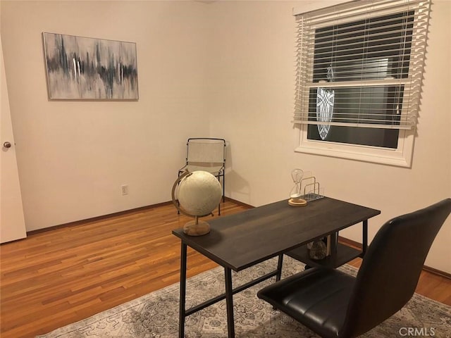 office area with hardwood / wood-style flooring