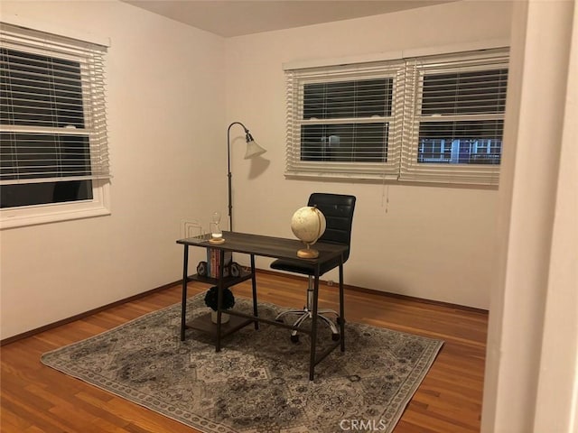 office area with hardwood / wood-style flooring