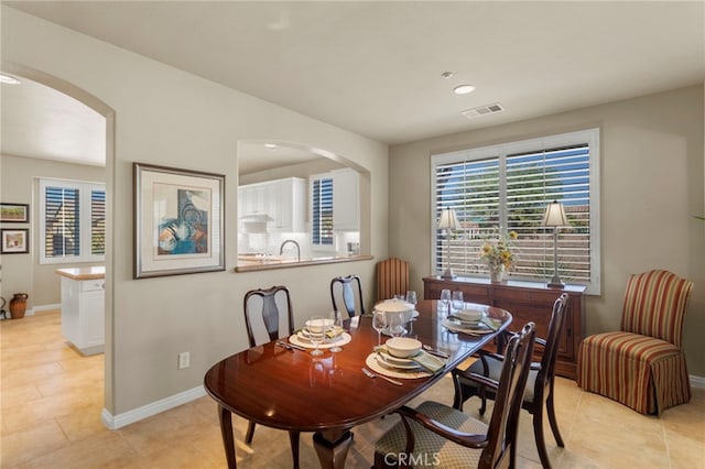 dining room featuring light tile patterned floors