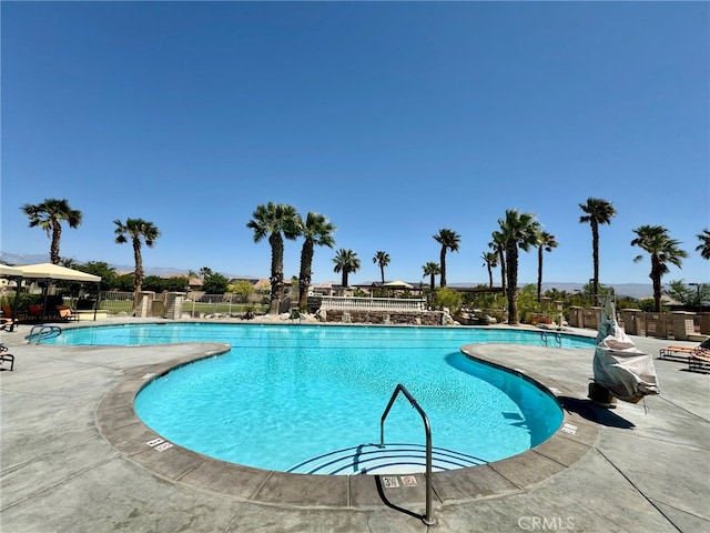 view of pool featuring a patio and a gazebo