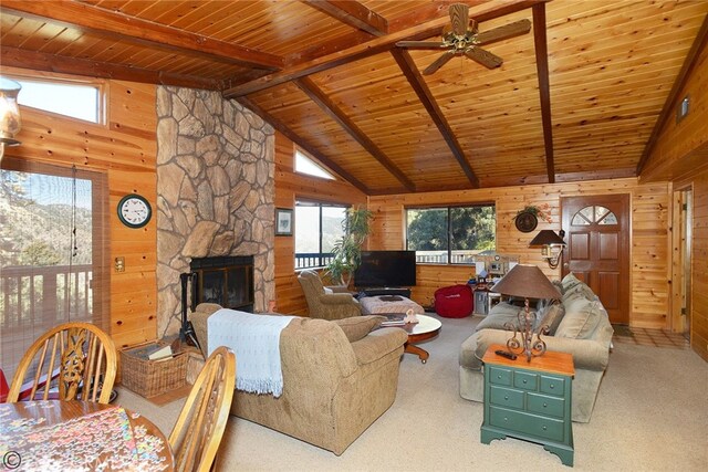 2428 Innsbruck Ct, Pine Mountain Club, CA 93222 - living room featuring wooden walls, a ceiling fan, wooden ceiling, a fireplace, and carpet