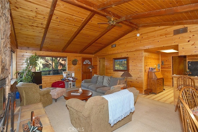 living room with wood walls, ceiling fan, vaulted ceiling with beams, and wooden ceiling