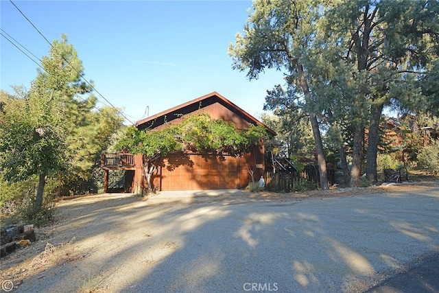 2428 Innsbruck Ct, Pine Mountain Club, CA 93222 - view of side of home featuring driveway