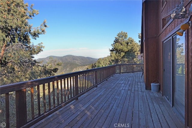 wooden terrace with a mountain view