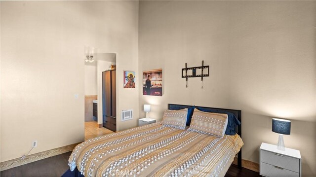 bedroom featuring hardwood / wood-style floors