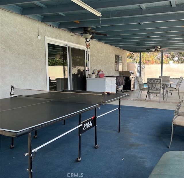 view of patio / terrace featuring area for grilling and ceiling fan