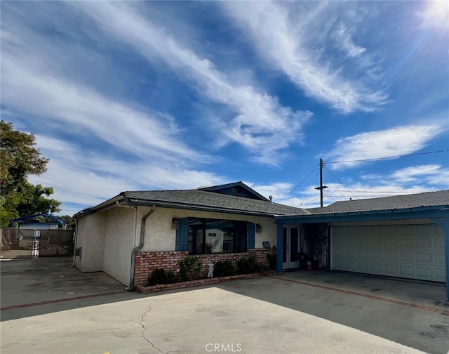 single story home featuring a garage