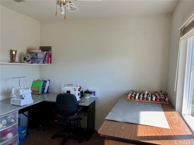 office area featuring carpet floors and ceiling fan