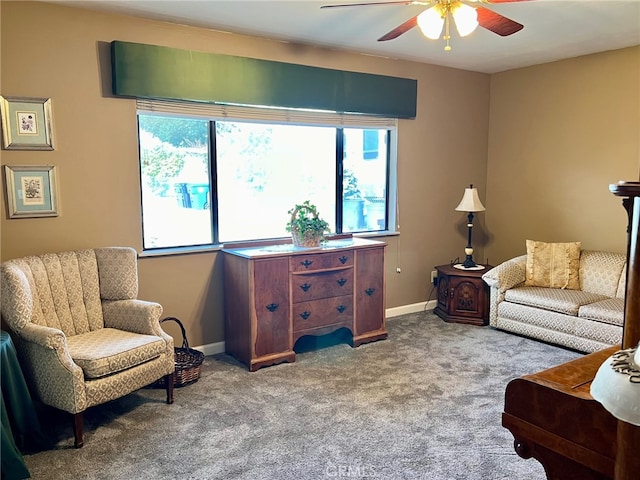 living room with carpet and ceiling fan