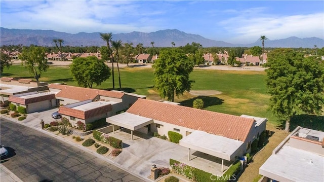 birds eye view of property with a mountain view