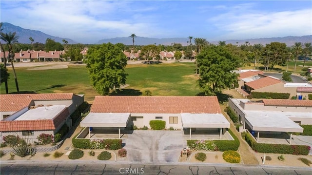 birds eye view of property featuring a mountain view