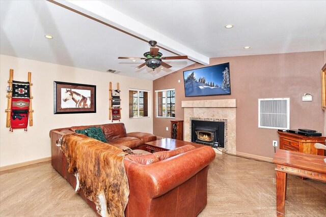 living room featuring ceiling fan and lofted ceiling with beams