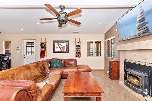 living room featuring lofted ceiling and ceiling fan