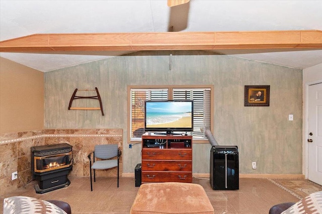 living room featuring lofted ceiling with beams and a wood stove