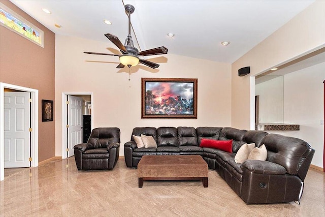 living room with lofted ceiling and ceiling fan