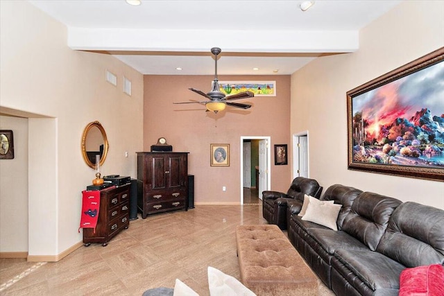 living room with beam ceiling and ceiling fan