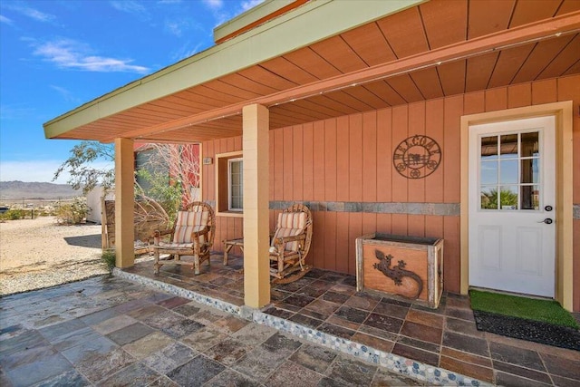 view of patio / terrace featuring a mountain view