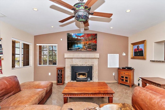 living room with light carpet, vaulted ceiling, and ceiling fan