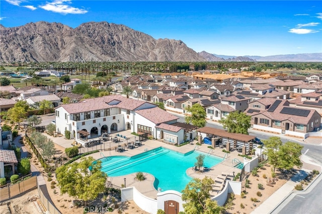 drone / aerial view featuring a mountain view