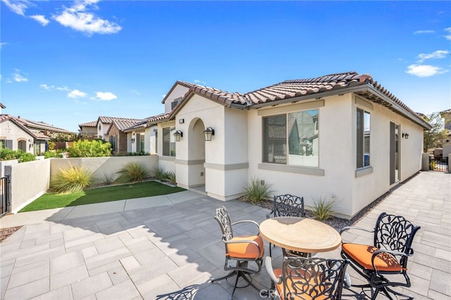 rear view of property with a patio area