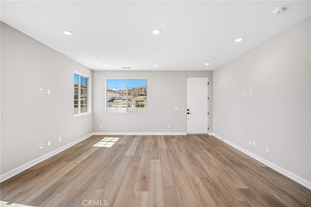 empty room with light wood-type flooring