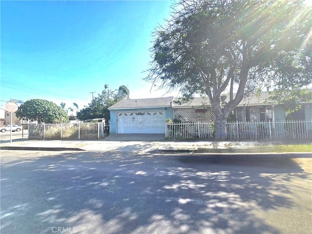 view of front of property with a garage