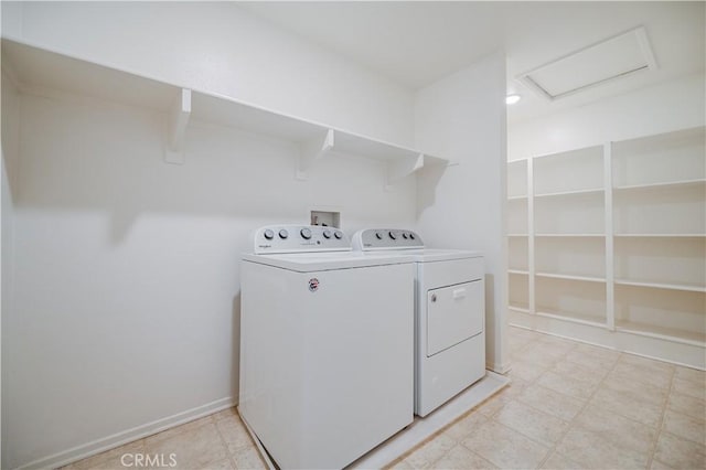 laundry room featuring separate washer and dryer