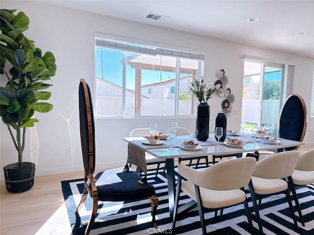 dining area featuring light hardwood / wood-style flooring