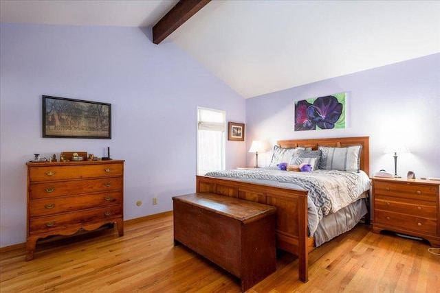 bedroom featuring high vaulted ceiling, light wood-type flooring, and beam ceiling