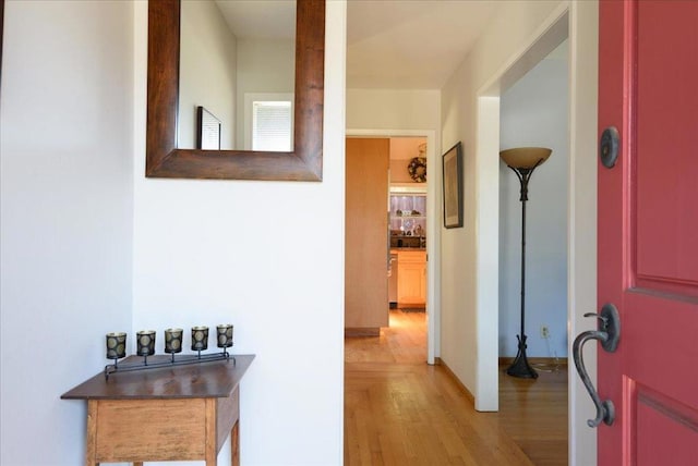 corridor featuring light hardwood / wood-style flooring