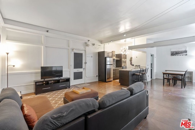 living room featuring an inviting chandelier