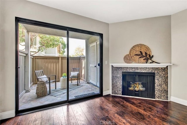 doorway to outside featuring hardwood / wood-style flooring