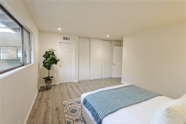 bedroom featuring light hardwood / wood-style floors