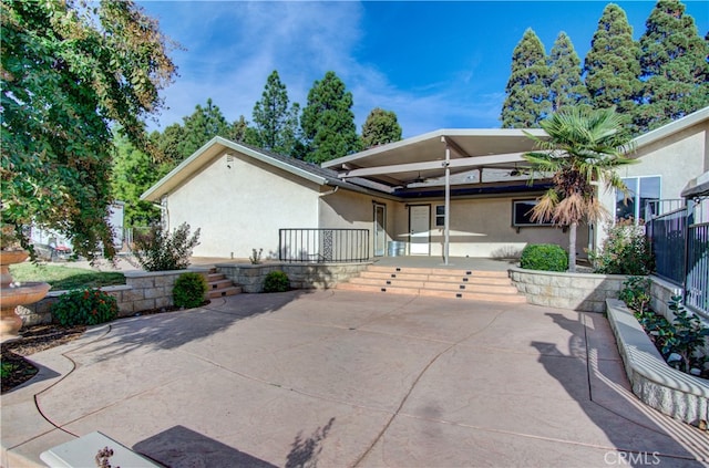 view of front of property with a patio area