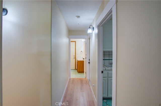 hallway featuring light hardwood / wood-style flooring