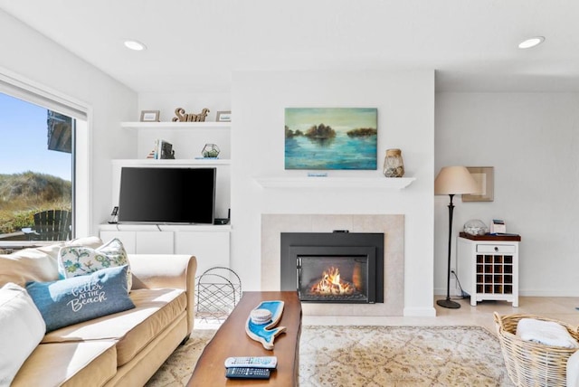 living room featuring a fireplace