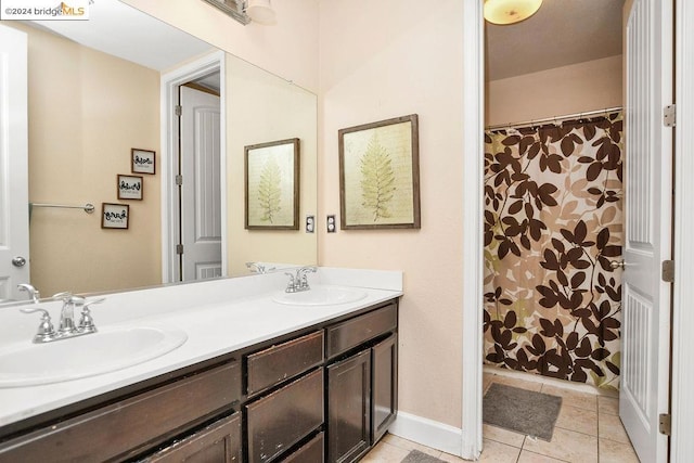 bathroom with vanity, tile patterned flooring, and a shower with shower curtain