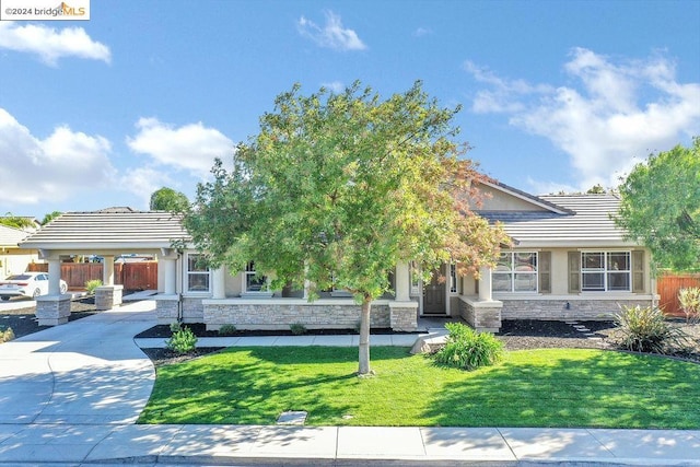 view of front of property with a front lawn