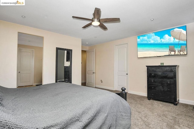 bedroom with light colored carpet and ceiling fan