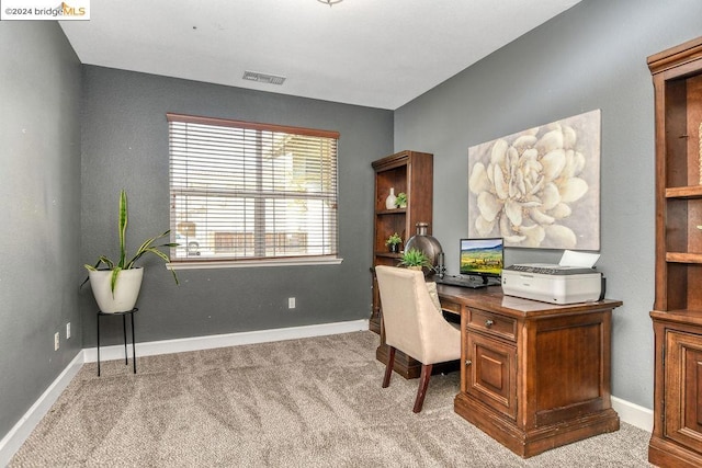 home office with light carpet