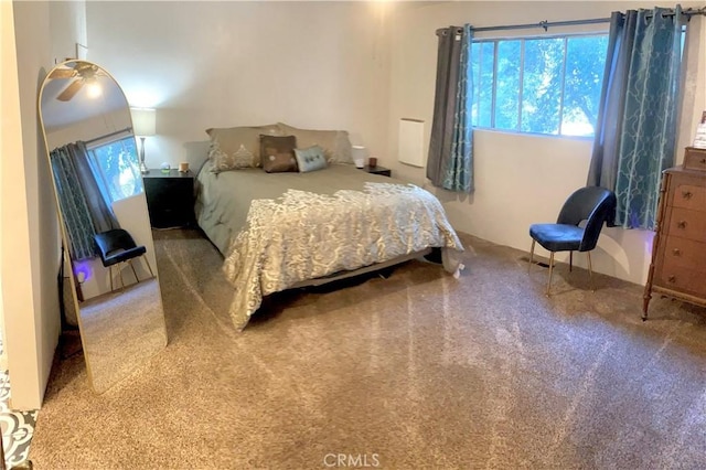 bedroom featuring light colored carpet