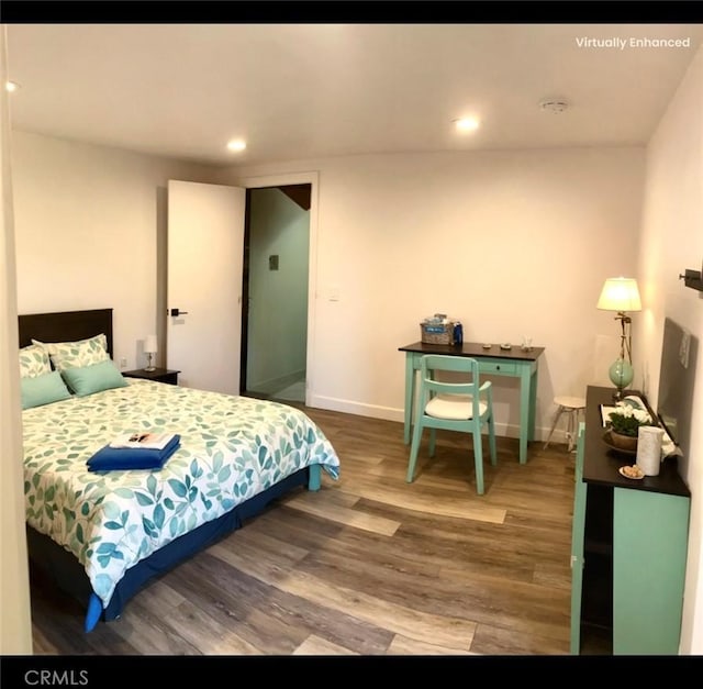 bedroom featuring hardwood / wood-style floors