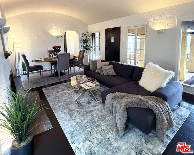 living room with lofted ceiling