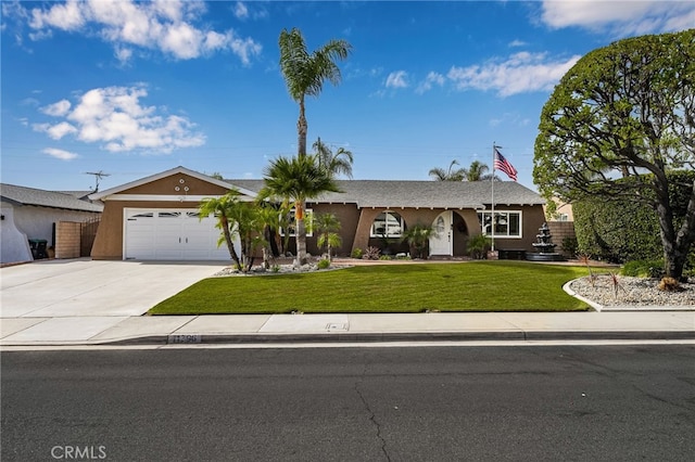 ranch-style home featuring a garage and a front yard