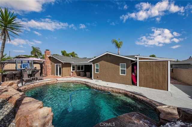 view of pool featuring a patio