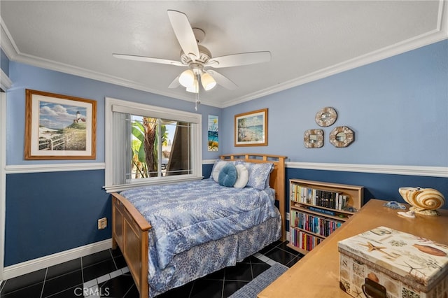 bedroom with dark tile patterned flooring, ceiling fan, and ornamental molding