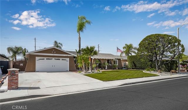 ranch-style home featuring a front lawn and a garage