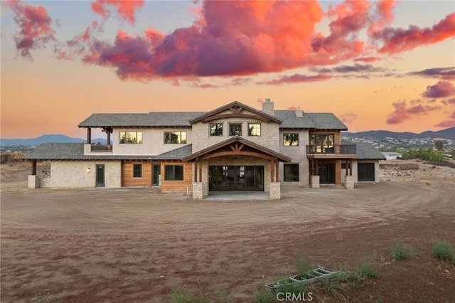 view of front of home featuring a mountain view