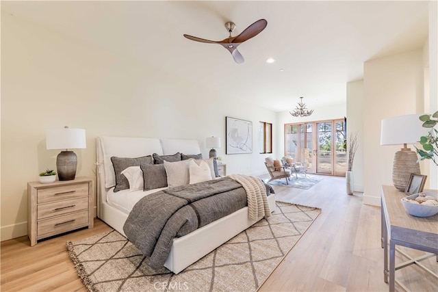 bedroom with light hardwood / wood-style flooring, access to outside, and ceiling fan